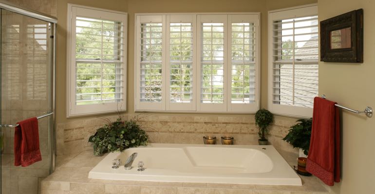 Plantation shutters in Houston bathroom.